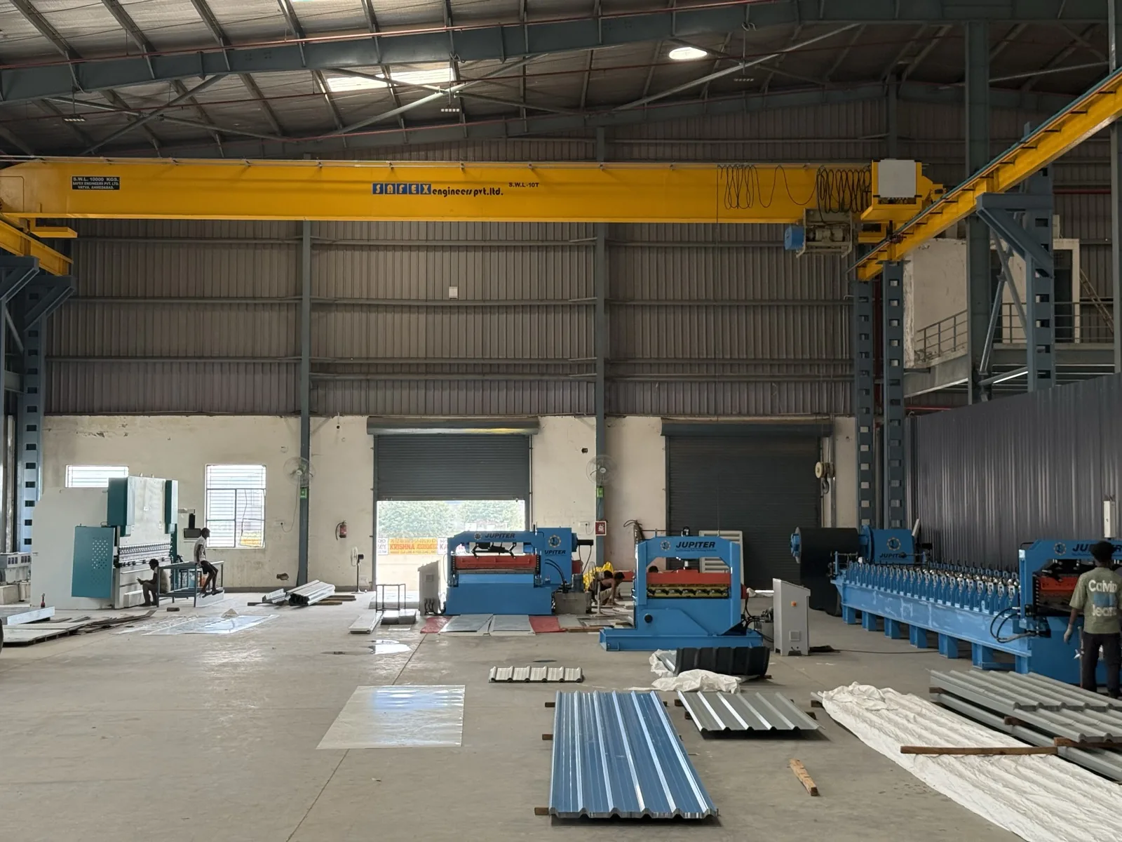 Line of machines — press brake, shearing machine and roll-former